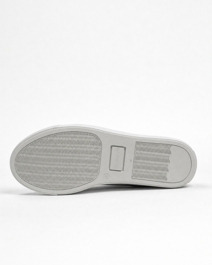 Rubber outsole of the Bivando Midnight Camo Sneaker, with tread pattern and embossed Bivando logo