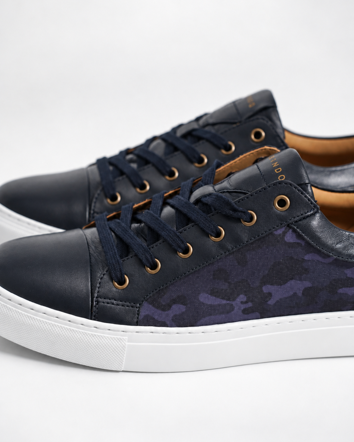 Bivando Midnight Camo Sneaker pair, close-up of navy leather toe caps, navy laces and tan leather lining